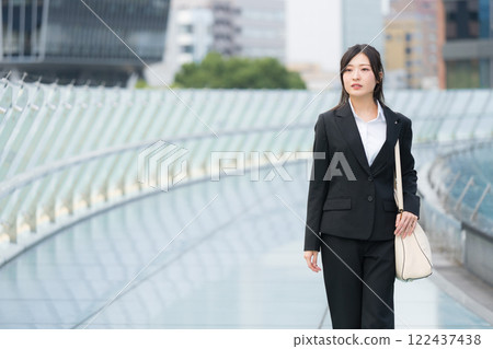 A businesswoman walking in a suit Newcomer Nagoya Sakae OASIS21 Water Spaceship A businesswoman walking in a suit Newcomer Nagoya Sakae OASIS21 Water Spaceship 122437438