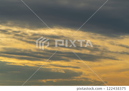 Cloudy winter sky a-3-1 warm color Cloudy winter sky a-3-1 warm color 122438375