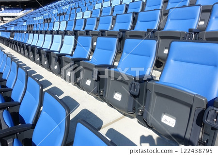 Seats lined up in the stadium Seats lined up in the stadium 122438795