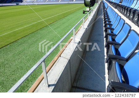 Seats lined up in the stadium 122438797