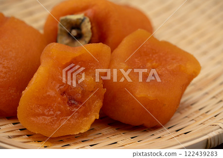 Close-up of juicy dried persimmons 122439283