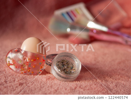 Set of brushes , glitter and cosmetics in pink tones, women's day gift. 122440574