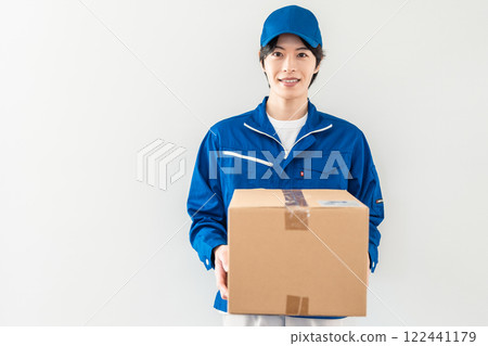 Young male staff delivering Young male staff delivering 122441179
