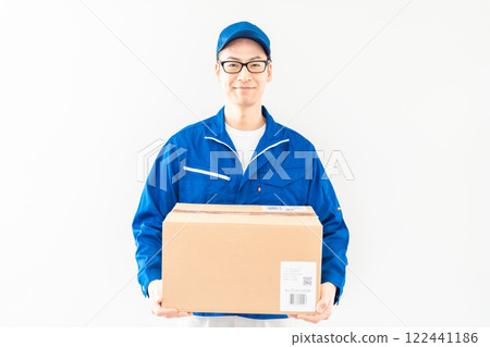 Smiling male delivery driver on white background Smiling male delivery driver on white background 122441186