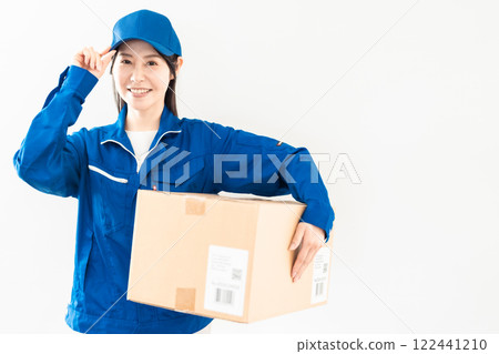 Smiling female delivery worker on white background 122441210