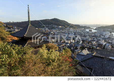 View of the Tenneiji Temple pagoda and Shimanami Kaido shining in the divine morning sun from the Cat's Narrow Road in Onomichi View of the Tenneiji Temple pagoda and Shimanami Kaido shining in the divine morning sun from the Cat's Narrow Road in Onomichi 122441672