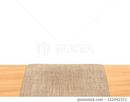 Empty sackcloth on wooden table, white background. Empty sackcloth on wooden table, white background. 122442551