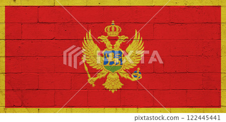Flag of Montenegro painted on a wall Flag of Montenegro painted on a wall 122445441