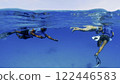 Instructor teaches swimming in the ocean underwater photography 122446583