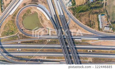 Drone shot aerial view of high angle view of intersection across the bridge against the countryside highway 122446885