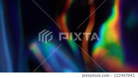 Defocused flicker. Rainbow reflection. Party bokeh effect. Rainbow highlight change shade flare. Abstract art background. Festive mood vibe. 122447041