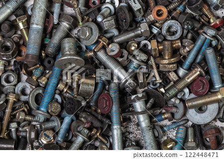 Background of bolts and nuts of different lengths and threads. Industry and production. Background of bolts and nuts of different lengths and threads. Industry and production. 122448471