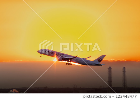 Jet plane taking off into the morning sky 122448477