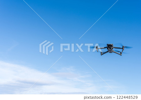 Blue sky and drone Blue sky and drone 122448529