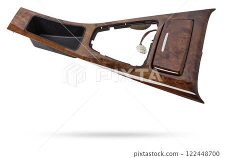 Wooden lining of a car gearbox selector on a white isolated background. 122448700