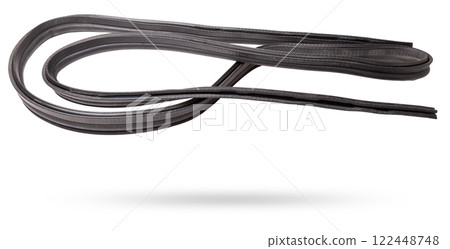 Rolled up black rubber sealant for elements of the car body, doors or trunk, for noise insulation, thermal and sound, preventing heat loss in the car interior. Sealing gasket for repair in a workshop. 122448748