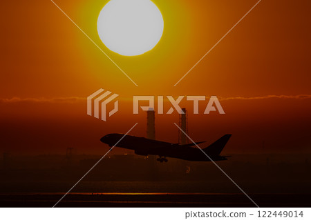 Jet plane taking off into the morning sky Jet plane taking off into the morning sky 122449014