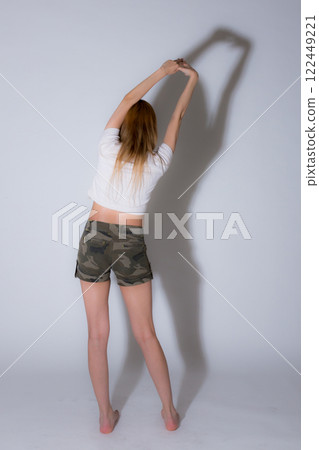 Dynamic woman back view 122449221