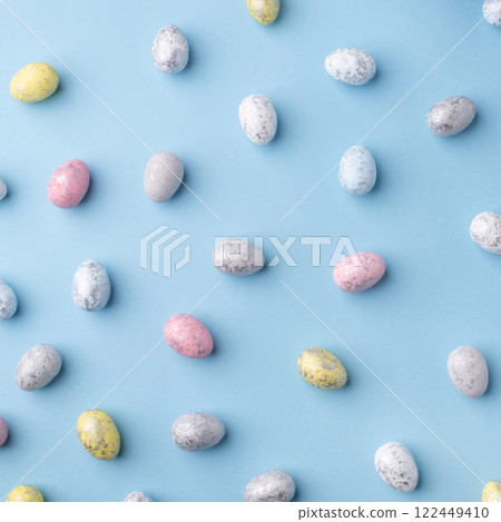Easter frame of eggs painted in blue color. 122449410