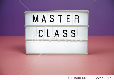 Master Class letterboard text on LED Lightbox on pink and purple background 122450047