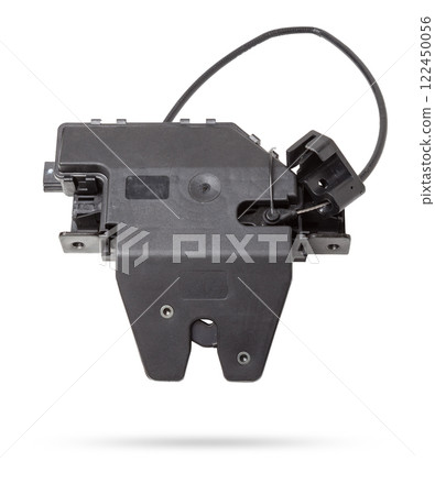 Detail of a car spare part made of black plastic and metal - rear trunk lock separately isolated on a white background. Repair in a car workshop, equipment for sale. Detail of a car spare part made of black plastic and metal - rear trunk lock separately isolated on a white background. Repair in a car workshop, equipment for sale. 122450056