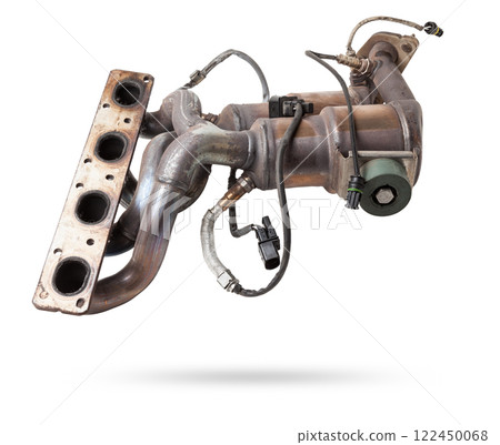 Automotive catalyst removed from a vehicle for repair with a ceramic coating inside as part of an exhaust system to remove harmful emissions in a car repair shop 122450068