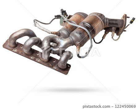 Automotive catalyst removed from a vehicle for repair with a ceramic coating inside as part of an exhaust system to remove harmful emissions in a car repair shop 122450069