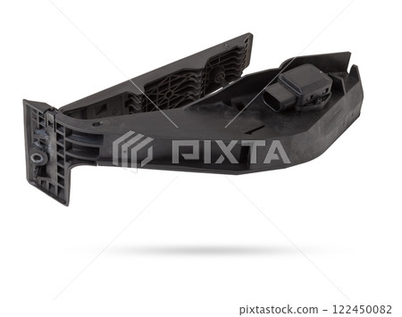 Gas pedal on a white isolated background in a photo studio for sale in a car service. Black auto part for replacement during repair in the workshop. Spare part junkyard. Gas pedal on a white isolated background in a photo studio for sale in a car service. Black auto part for replacement during repair in the workshop. Spare part junkyard. 122450082