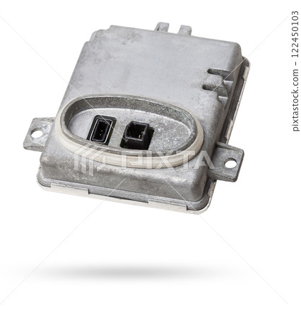 Spare part metall car engine control unit with metal elements on a white isolated background is the connecting center subsystems, units and assemblies. Rear view of the electronic xenon ignition unit 122450103