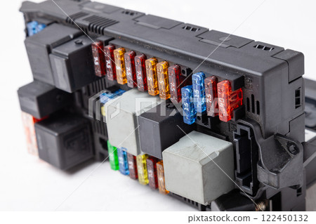 Automotive fuses box in different colors and each color is responsible for the specific value of the protection defined in amperes. Catalog of spare parts. Automotive fuses box in different colors and each color is responsible for the specific value of the protection defined in amperes. Catalog of spare parts. 122450132