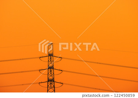 Tokyo cityscape in Japan: Sky dyed orange... View of power towers and transmission lines = January 30, 2025 Tokyo cityscape in Japan: Sky dyed orange... View of power towers and transmission lines = January 30, 2025 122450859
