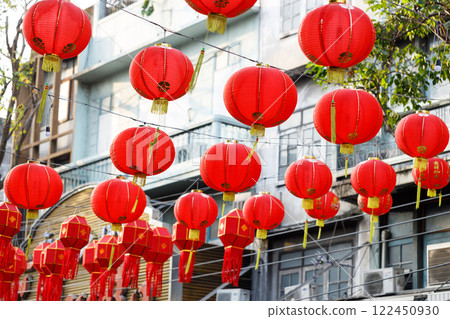Spring festival, Lunar or Chinese new year lanterns decorated over street in old town, Thailand. The letters mean Luck, Congratulations, Blessing and Happiness 122450930