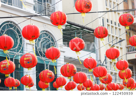 Spring festival, Lunar or Chinese new year lanterns decorated over street in old town, Thailand. The letters mean Luck, Congratulations, Blessing and Happiness 122450939