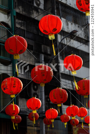 Spring festival, Lunar or Chinese new year lanterns decorated over street in old town, Thailand. The letters mean Luck, Congratulations, Blessing and Happiness Spring festival, Lunar or Chinese new year lanterns decorated over street in old town, Thailand. The letters mean Luck, Congratulations, Blessing and Happiness 122450941