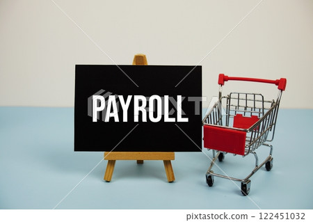 Payroll text message and trolley shopping cart on blue background Payroll text message and trolley shopping cart on blue background 122451032