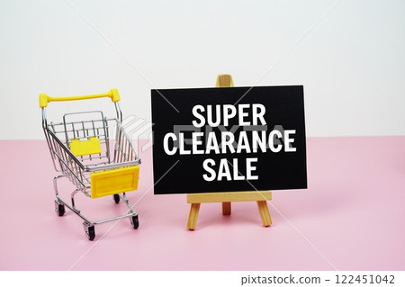 Super Clearance Sale text message and trolley shopping cart on pink background Super Clearance Sale text message and trolley shopping cart on pink background 122451042