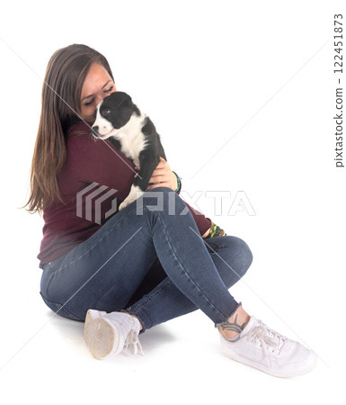 puppy border collie and woman in studio puppy border collie and woman in studio 122451873