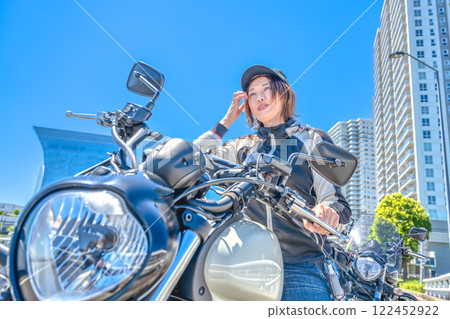 Female rider touring Yokohama 122452922