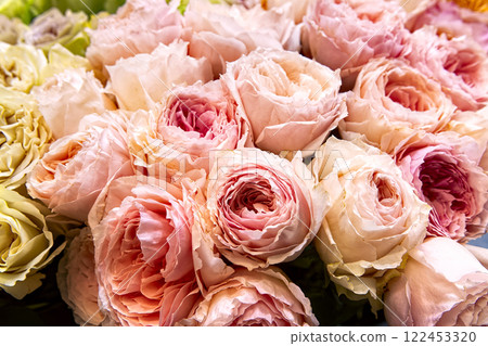 Bouquet of fresh pink and yellow roses. Colorful floral background. Bouquet of fresh pink and yellow roses. Colorful floral background. 122453320