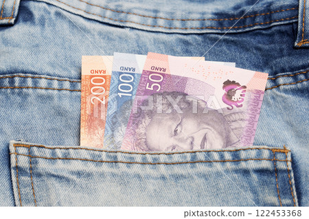 South African Rand in the pocket of blue jeans 122453368