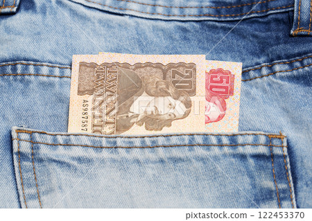 Old South African Rand in the pocket of blue jeans Old South African Rand in the pocket of blue jeans 122453370