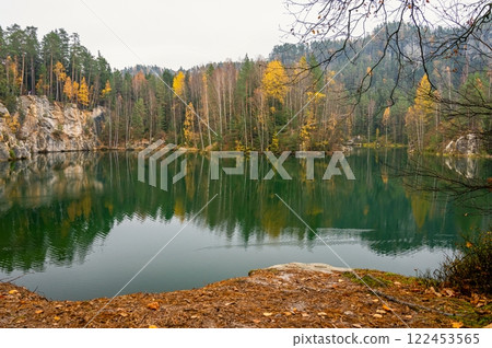 Beautiful autumn landscape with old Chapel of the Mother of God in Veveri. Sunset and beautiful blue sky with clouds. Colorful nature background on autumn season. Brno - Czech Republic. 122453565