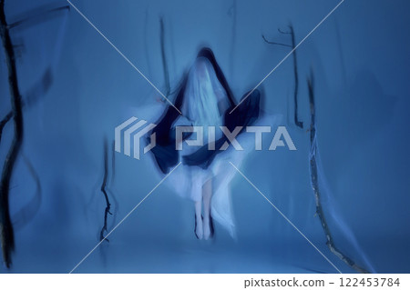 Floating between light and shadow. Two graceful ballerinas in light and dark veil moving in endless waltz. Supernatural elegance. 122453784