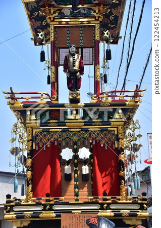 Takayama City, Gifu Prefecture, Japan - Spring Takayama Festival - Karako doll floats and beautiful blue sky - Gorgeous decorations of floats called yatai 122454213