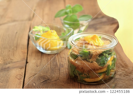 Homemade syrup made from fresh leaves of Plectranthus (Coleus) amboinicus, lemon slices and brown sugar. Homemade syrup made from fresh leaves of Plectranthus (Coleus) amboinicus, lemon slices and brown sugar. 122455186