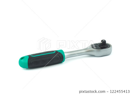 Detail of a green ratchet wrench type tool with a socket on it. On white background. 122455413