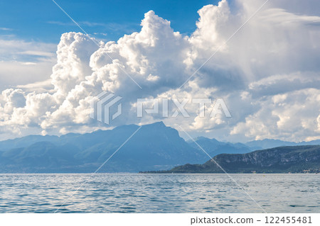 Lake Garda with mountains in background, view from Lazise town shore, Italy, Europe Lake Garda with mountains in background, view from Lazise town shore, Italy, Europe 122455481