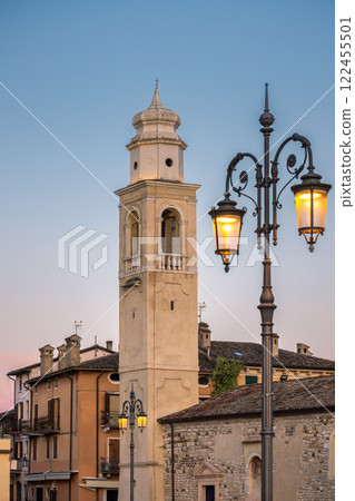 Church in Lazise town on shore of Lake Garda in the early evening, Italy, Europe. 122455501