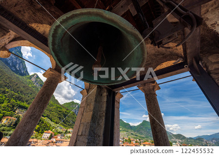 Bell in Torre Apponale tower in Riva del Garda, town on the shores of Lake Garda with mountains in background, Italy, Europe. Bell in Torre Apponale tower in Riva del Garda, town on the shores of Lake Garda with mountains in background, Italy, Europe. 122455532