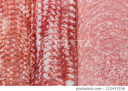Sausage background texture, pattern from sausage slices Sausage background texture, pattern from sausage slices 122455556
